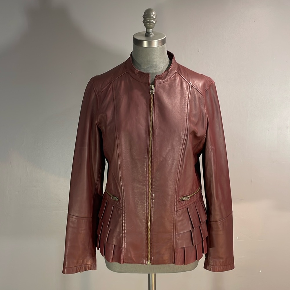 Unique Bordeaux/Oxblood leather jacket size large.  Fully lined.  Lovely shape